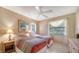 Comfortable bedroom featuring two twin beds with ample natural light at 5649 Summerside Ln # 41B, Sarasota, FL 34231