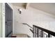 Close-up of condo entryway with stucco walls, unit number, and dark-colored door at 5649 Summerside Ln # 41B, Sarasota, FL 34231