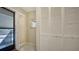 Entryway with tile floor, closet, and view to exterior stairs at 5649 Summerside Ln # 41B, Sarasota, FL 34231