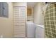 Convenient laundry room area with white appliances and storage at 5649 Summerside Ln # 41B, Sarasota, FL 34231