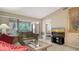 Living room with sliding glass doors to the screened in lanai at 5649 Summerside Ln # 41B, Sarasota, FL 34231