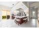 Spacious kitchen with a large island, stainless steel appliances, and easy access to the outdoor patio at 5751 Wilena Pl, Sarasota, FL 34238