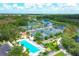 Aerial view showcasing tennis courts, a swimming pool, and lush landscaping, and surrounding lake at 5881 Girona Pl, Sarasota, FL 34238