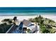 Beach access home with stunning ocean views and a lush, tropical landscape at 600 Sutton Pl # B305, Longboat Key, FL 34228
