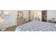 Bedroom featuring an ample storage and a closet at 600 Sutton Pl # B305, Longboat Key, FL 34228