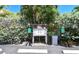 Community car wash station with hoses and parking, providing convenient maintenance for resident vehicles at 600 Sutton Pl # B305, Longboat Key, FL 34228