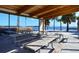 Covered pavilion with picnic tables overlooking the beautiful waterfront at 600 Sutton Pl # B305, Longboat Key, FL 34228
