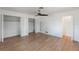 Bedroom showcasing hardwood floors and plenty of closet space at 609 Glen Oak Rd, Venice, FL 34293