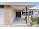 Inviting front entrance with double doors and stylish landscaping at 609 Glen Oak Rd, Venice, FL 34293