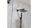 Contemporary bathroom shower with rainfall showerhead and handheld sprayer against marble-look tile at 609 Glen Oak Rd, Venice, FL 34293