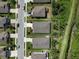 Aerial view showing the roof and yard of the home surrounded by similar properties at 6124 35Th E Ct, Bradenton, FL 34203