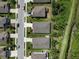 Bird's eye view of home situated in a residential neighborhood with nearby natural spaces at 6124 35Th E Ct, Bradenton, FL 34203