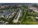 High-angle view of a community featuring neatly arranged homes and multiple ponds at 6124 35Th E Ct, Bradenton, FL 34203