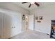 Cozy bedroom featuring neutral walls, carpeted floors, and a double-door closet for ample storage at 6124 35Th E Ct, Bradenton, FL 34203