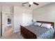 Bedroom featuring a wooden bed frame, closet, and neutral colored carpet at 6124 35Th E Ct, Bradenton, FL 34203
