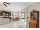 Bright kitchen area with tile flooring, an island and a sliding glass door for lots of natural light at 6124 35Th E Ct, Bradenton, FL 34203