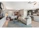 Cozy living space with view of kitchen, dining area and front entrance at 6124 35Th E Ct, Bradenton, FL 34203