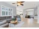 Open-concept living room seamlessly flows into the kitchen and dining area at 6312 67Th E St, Bradenton, FL 34203