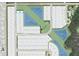 Aerial view of community layout with ponds, and roadways in a planned residential development at 6908 Prairie Oak Way, Nokomis, FL 34275