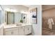 Bathroom with double vanity, and walk-in closet at 7048 Foxboro Way, Nokomis, FL 34275