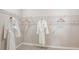 Spacious walk-in closet complete with hanging racks at 7048 Foxboro Way, Nokomis, FL 34275