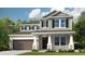 Charming two-story home featuring a covered porch, gray siding, black shutters and a two car garage at 7052 Foxboro Way, Nokomis, FL 34275