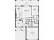 Detailed first-floor plan showcasing an open-concept layout, primary suite, and two-car garage at 7053 Foxboro Way, Nokomis, FL 34275