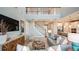 Spacious living room with staircase and contemporary furnishings, creating a welcoming atmosphere at 7053 Foxboro Way, Nokomis, FL 34275