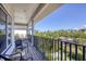 Balcony with seating that offers expansive outdoor and water views at 7142 Hawks Harbor Cir, Bradenton, FL 34207
