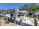 View of boat at dock with a professionally rigged fishing boat at a private residence at 7142 Hawks Harbor Cir, Bradenton, FL 34207