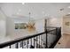 View of the living room from the second floor, with fan at 7142 Hawks Harbor Cir, Bradenton, FL 34207