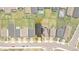Aerial view of the property showcasing the home's placement within the community and its relation to nearby homes at 11571 Little River Way, Parrish, FL 34219