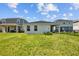 Expansive backyard with lush lawn and black fencing provides privacy and ample space for recreation and relaxation at 11571 Little River Way, Parrish, FL 34219