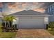 Attractive single-Gathering home with a spacious garage and lush landscaping at 11571 Little River Way, Parrish, FL 34219