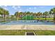 Community outdoor workout area has fitness equipment for residents to enjoy including parallel bars and climbing apparatus at 11571 Little River Way, Parrish, FL 34219
