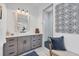 Stylish bathroom vanity area with modern sink, lighting, and artistic decorative touches at 14322 Cando Ave, Port Charlotte, FL 33981
