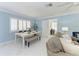 An open-concept living space with views of the living and dining areas at 148 N Blvd Of The Presidents, Sarasota, FL 34236