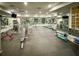 Spacious fitness center featuring modern equipment and mirrors for a complete workout experience at 17616 Bright Wheat Dr, Lithia, FL 33547