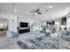 Open-concept living space featuring a modern kitchen and dining area, perfect for entertaining at 17616 Bright Wheat Dr, Lithia, FL 33547