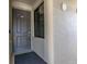 Exterior shot of the building's front door, displaying the unit number at 17810 Gawthrop Dr # 406, Bradenton, FL 34211