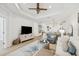 Stylish living room boasts modern furnishings, light wood floors, and an open concept design at 17827 Cherished Loop, Lakewood Ranch, FL 34211