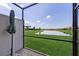 Relaxing screened patio offering views of a scenic pond and expansive green space at 17827 Cherished Loop, Lakewood Ranch, FL 34211