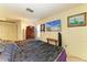 Bedroom featuring closet, dresser, TV, full size bed, and a standard window at 1809 67Th W St, Bradenton, FL 34209