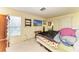 Bedroom with standard window, TV, and full size bed at 1809 67Th W St, Bradenton, FL 34209