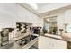 Efficient kitchen design includes stainless steel appliances, black and white backsplash, and lots of natural light at 1809 67Th W St, Bradenton, FL 34209
