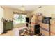 Office with a large window view and rug; the room is cluttered with moving boxes at 1809 67Th W St, Bradenton, FL 34209