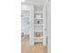 Bright hallway with built-in shelving, perfect for extra storage and organization at 1921 Fern Ave, Sarasota, FL 34235