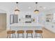 Spacious, well-lit kitchen featuring an island, modern appliances, and ample counter space at 1921 Fern Ave, Sarasota, FL 34235