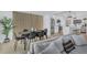 Inviting living space with modern decor, seamlessly flowing into the dining and kitchen areas at 1921 Fern Ave, Sarasota, FL 34235