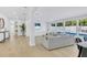 Open living space features poolside views and modern decor at 1921 Fern Ave, Sarasota, FL 34235